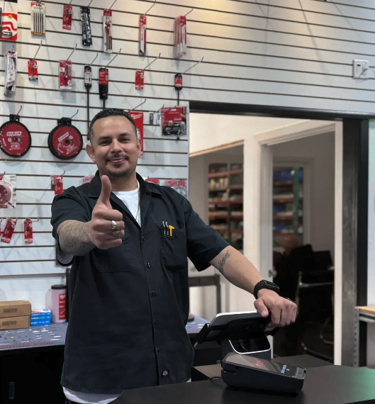 Mario Castillo staff member at the register